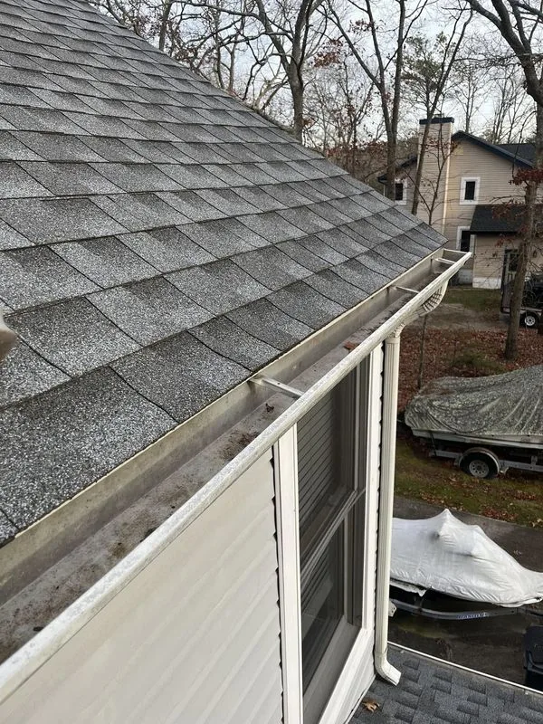Gutter cleaning from rooftop