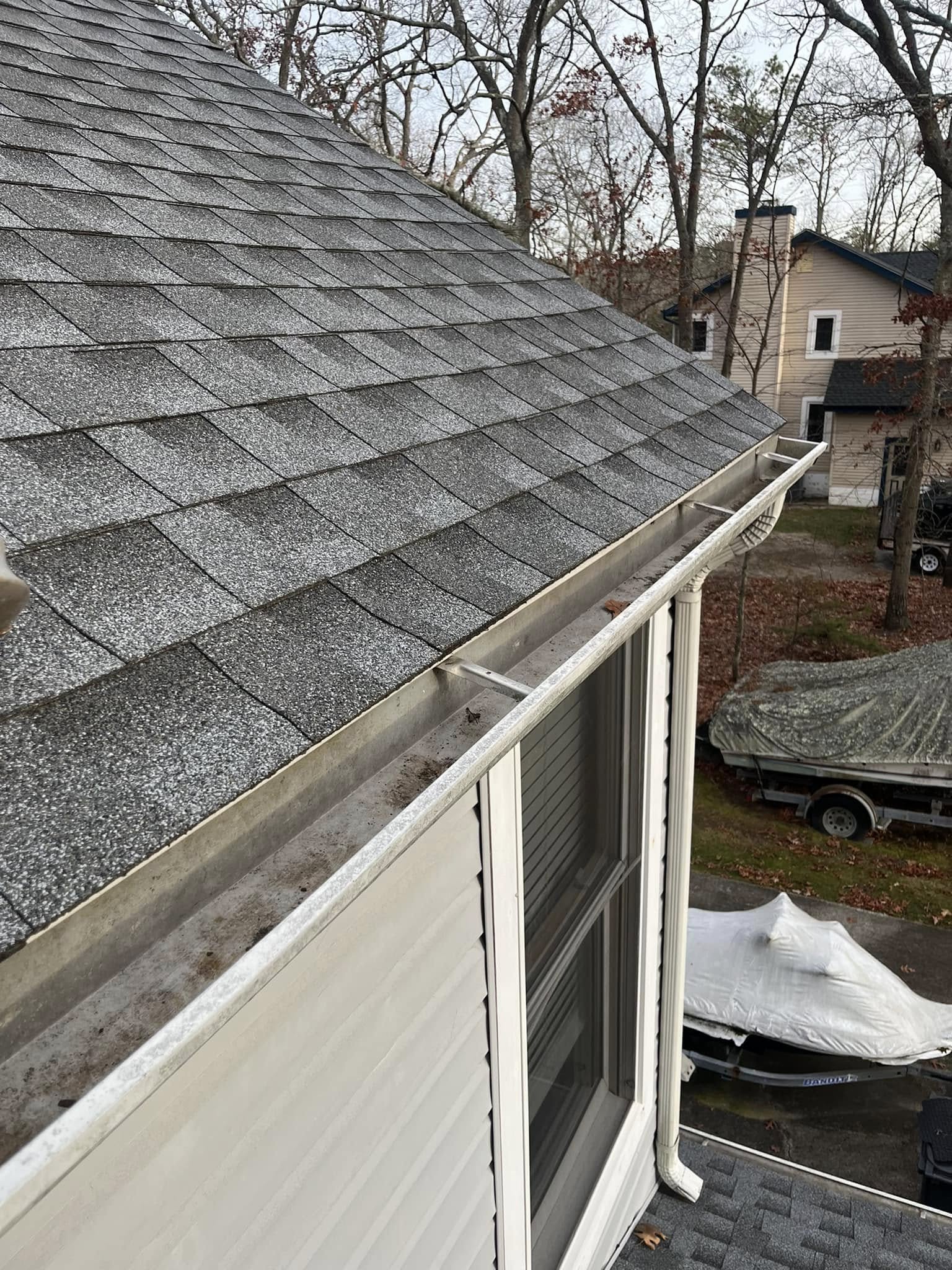 Gutter cleaning from rooftop